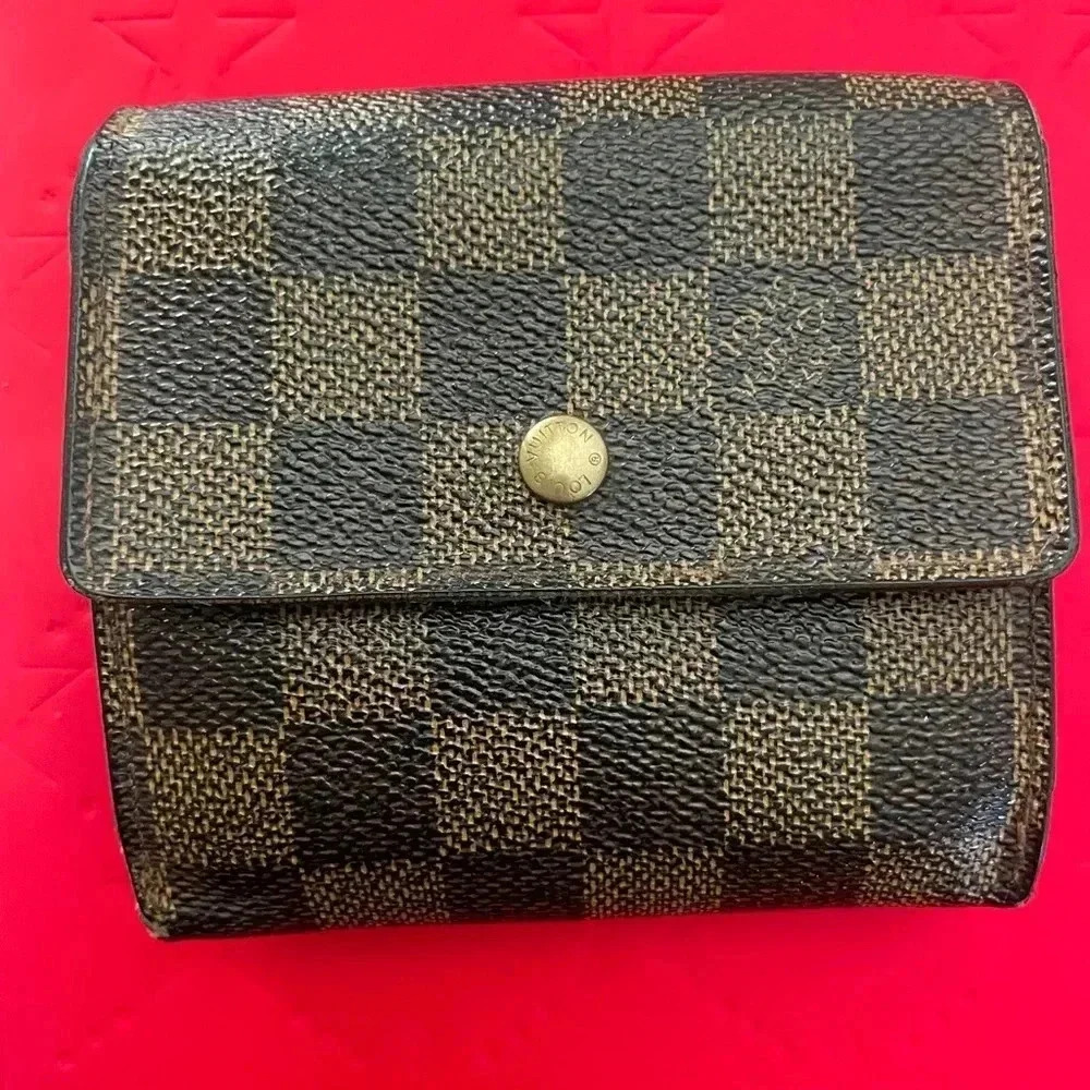 Louis Vuitton damier ebene Elise monogram wallet.